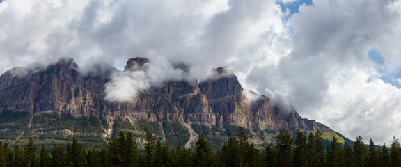 Beautiful Panoramic View of Canadian Mountain Landscape during a vibrant sunny summer day. Taken in Banff National Park, Alberta, Canada.