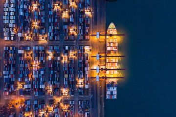 Aerial top view of container cargo ship in the export and import business and logistics...