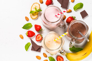 Set of milkshakes in mason jars.
