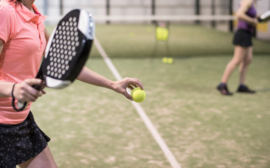 Padel tennis sports training. Women in court