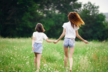 Fototapeta premium mother and daughter in the park