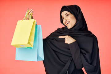 young woman with shopping bags