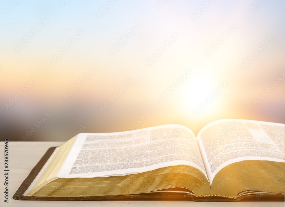 Poster holy bible book on a wooden background