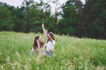 mother and daughter having fun in the park