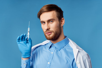 young doctor with syringe