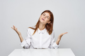 happy woman sitting on the floor with laptop