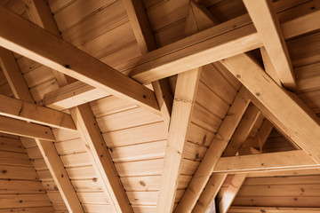 Wooden joints in ceilings in a modern wooden hut.