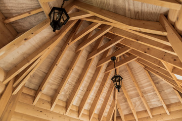 Wooden joints in ceilings in a modern wooden hut.