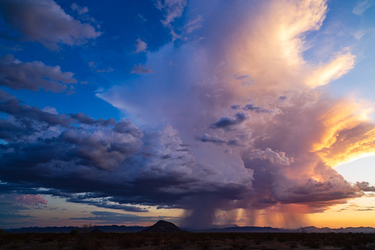 Dramatic sky with storm clouds at sunset