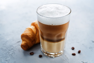 Coffee drink with fresh croissants