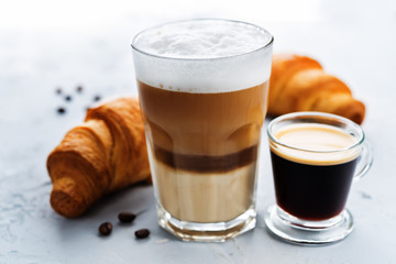 Coffee drink with fresh croissants