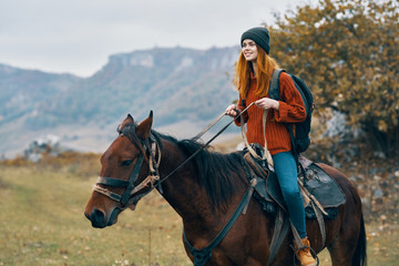 young woman riding horse