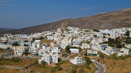 Aerial drone panoramic photo of picturesque main village or chora and castle of Amorgos island...