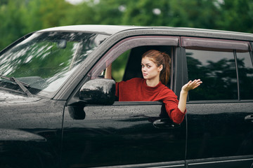 young woman in car