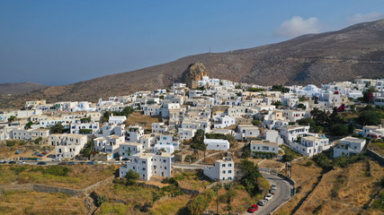 Fototapeta na wymiar Aerial drone panoramic photo of picturesque main village or chora and castle of Amorgos island built on top of cliff overlooking the Aegean blue sea, Cyclades, Greece