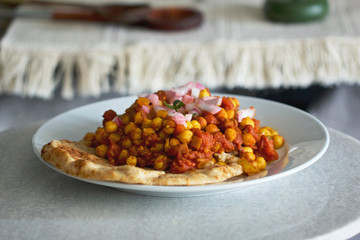Chana Masala Indian Chickpea Corn Dish with Naan Bread