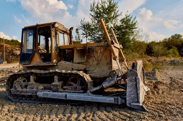 Fototapeta premium yellow bulldozer at construction site