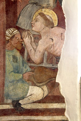 Obraz premium martirio di San Lorenzo; affresco nella chiesa di San Tommaso a Cles, Trentino