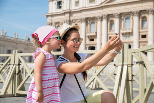 Woman And Child Taking Selfie Near St. Peter's Basilica