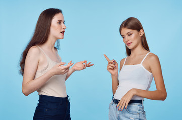 two women with thumbs up