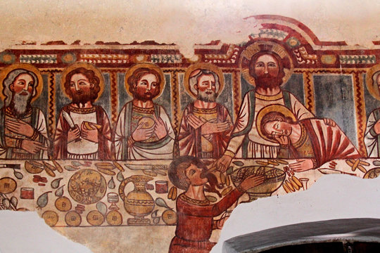 Cristo porge il boccone a Giuda; particolare dell'affresco dell'Ultima Cena nella chiesa di San Vigilio a Cles, Trentino