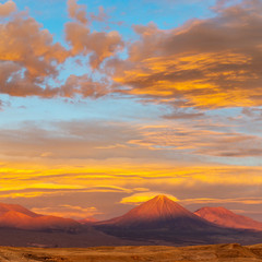 A wonderful sunset in the Atacama desert with the Moon Valley and the Licancabur volcano located near San Pedro de Atacama in north Chile.