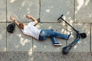 Unconscious Man Lying On Street After Accident Electric Scooter