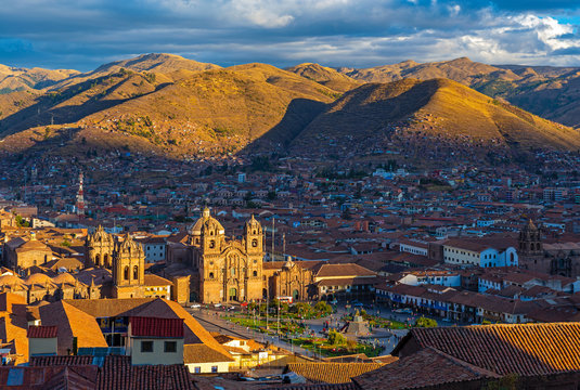 An aerial view of the Plaza de Armas main square of Cusco at sunset, Peru.
