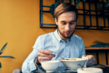 young man with cup of tea