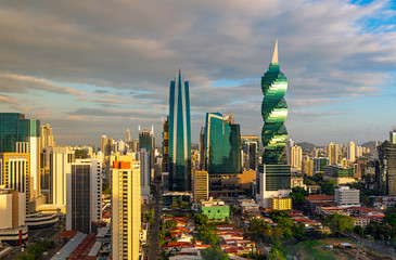 Obraz premium The colorful panoramic skyline of Panama City at sunset with high rise skyscrapers, Panama, Central America.