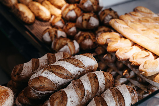 Assorted bread store display, indoor of french bakery.