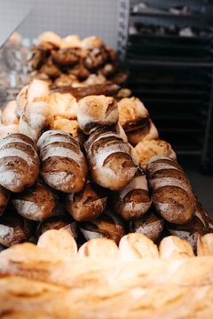 Assorted bread store display, indoor of french bakery.
