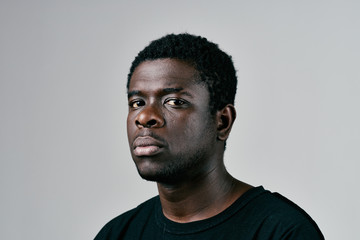 Obraz premium portrait of a young man isolated on black background