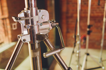 A studio strobe mounted on a light stand.