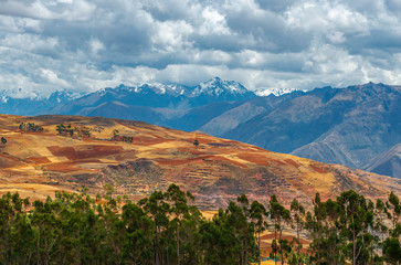 Agriculture landscape with terraced fields in rural villages of the Sacred Valley of the Inca, Cusco Region, Peru.