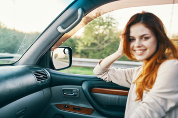 young woman in a car