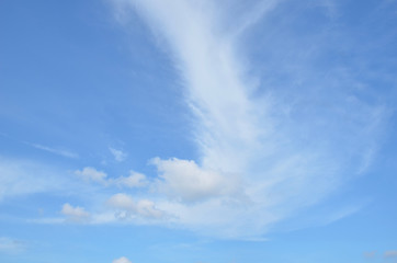 Fototapeta na wymiar Subtle pastel background of clouds in blue sky 
