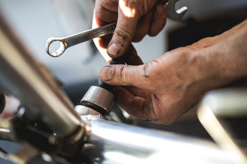 Fixing the bicycle problem in workshop stock photo