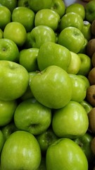 green apples on black background