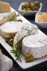 Aged cheese round and slices