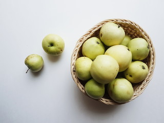 green apples in a basket