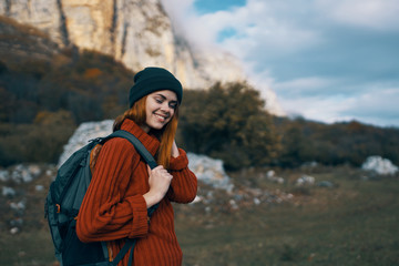 young woman in mountains