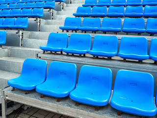 Naklejka premium Blue chair on the grandstand