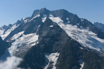 Northern great caucasus mountains near dombay with glaciers and snow in august 2019, original raw...