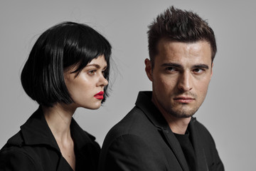 portrait of young man and woman