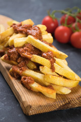 French fries with minced meat salsa