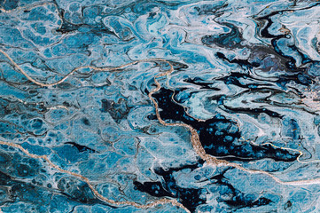 Fluid Art. Abstract colorful background, wallpaper. Mixing paints. Modern art. Marble texture	