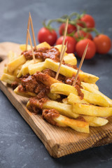 French fries with minced meat salsa
