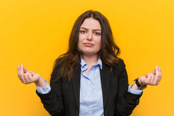 Young plus size caucasian business woman showing that he has no money.