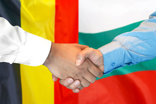 Business handshake on the background of two flags. Men handshake on the background of the Belgium and Bulgaria flag. Support concept